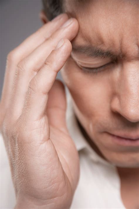 vilka är symtomen på huvudvärk